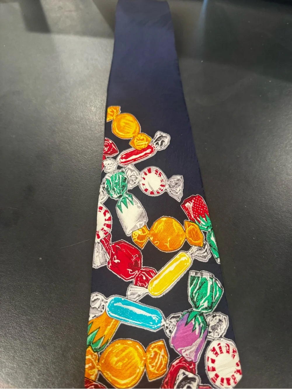 Peerless- Quality Confections Navy Tie with Colorful Candy Print